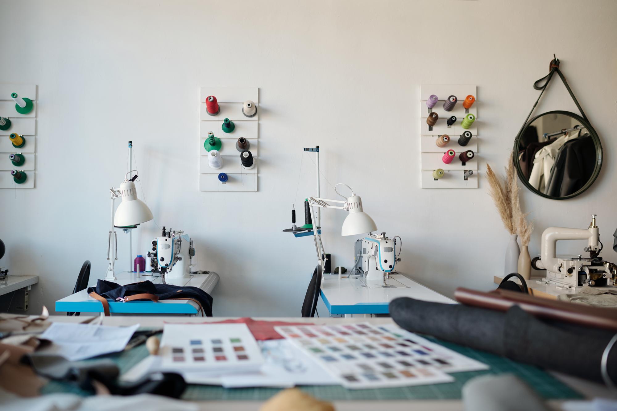 atelier workspace with embroidery machine and threads